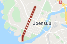 Länsikatu kulkee keskustan reunalla urheilukentän kyljessä.png