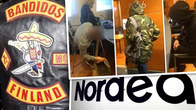 Epäilyn mukaan Nordean työntekijä oli valmis turvautumaan jopa Bandidosin apuun. Kuvan laitimmaiset miehet ovat Nordean työtekijöitä, keskellä oleva mies on Tor-verkosta hankittu apuri.­KUVA: NIKO RANTA / IS, LEHTIKUVA