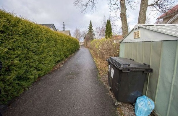 Henkirikoksen uhriksi joutuneen miehen ruumis löydettiin tästä roska-astiasta. KUVA: POLIISI