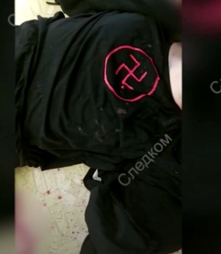 Kuvankaappaus videolta, missä näkyy ampujan paita
