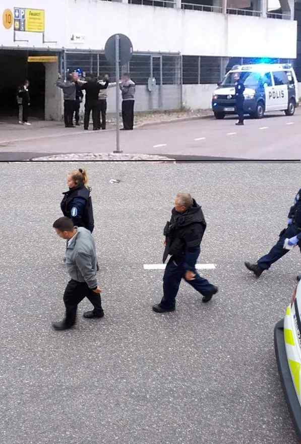 Mannet seisovat tapansa mukaan tumput suorassa, tällä kertaa poliisin käskystä.jpg