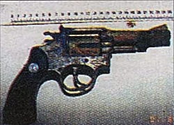 Murha-ase 22 kal. Taurus, jolla molempia uhreja ammuttiin päähän.Löytyi järven pohjasta..jpg