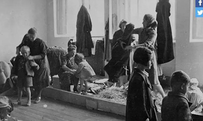 Lapsia tutkitaan rodunjalostuksen nimissä entisen Jugoslavian Celjessä elokuussa 1942.jpg